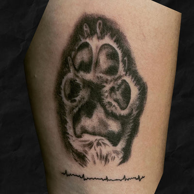 Hundepfote original abdruck als tattoo, gestochen im atelier hannibal tattoo studio in erftstadt