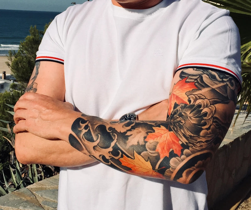 Japanese-Style Tattoo-Sleeves in Orange-Schwarz von Hannibal, Tattoo-Künstler Hürth